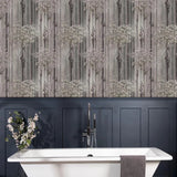 WM90840101 Cherry blossom forest flowering branches gray pink purple tree trunks Wallpaper
